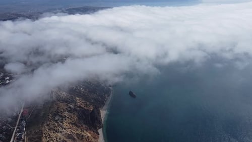 High Above the Thick Fog Like Beautiful Ocean of Clouds at Sunrise