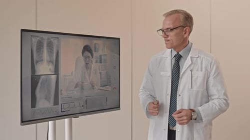 Doctor Presents Telemedicine Consultation with X-Rays