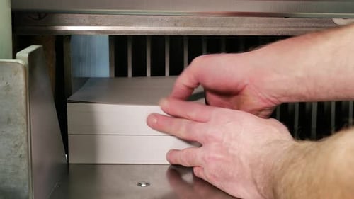 Industrial process of making envelopes in a factory