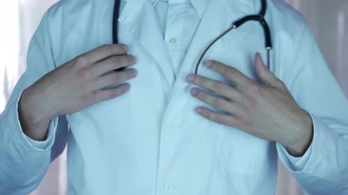 Putting on Stethoscope and Doctor's Coat