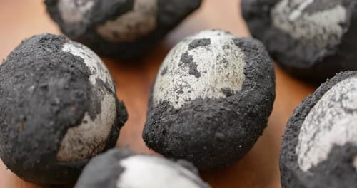 Close up of Chinese Century Eggs on Wood