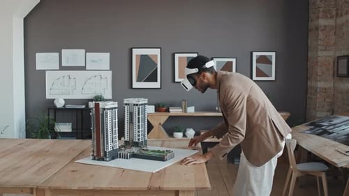 Architect Interacting with Building Model in VR