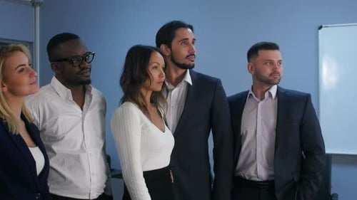 Portrait of Business Team Standing in Office