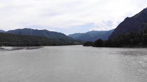RUSSIA - ALTAI. Aerial Shooting, Top Angle. Vertical Panorama From a Mountain River To a Mountain