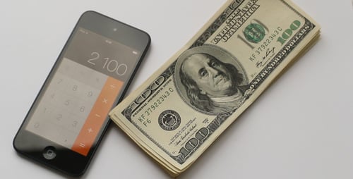 Dollar und Taschenrechner