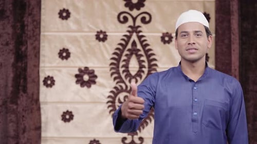 Man with Thumb Up During Islamic Holiday