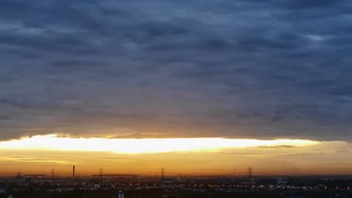 Sunrise Over a City Skyline Aerial Panorama