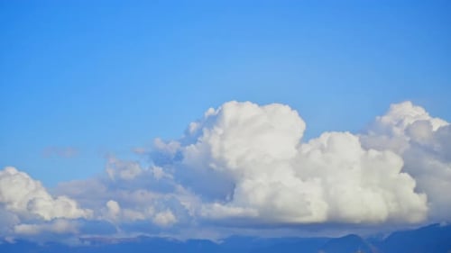Time Lapse of Puffy White Clouds in Blue Sky