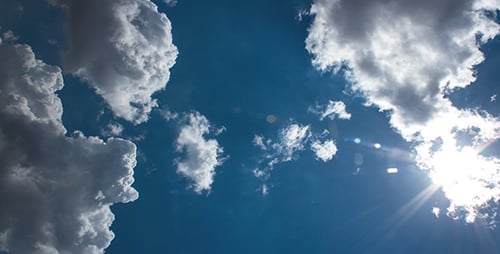 Clouds Moving Slowly in Blue Sky