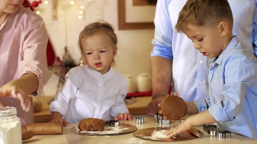 Family Bakes Christmas Cookies Together