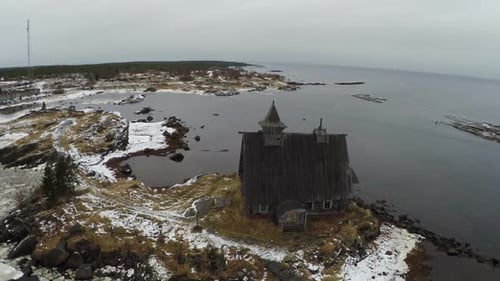 Wooden House at the Edge of Waterside, Aerial View