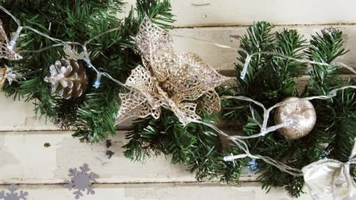 Christmas Garland With Decorations on White Table