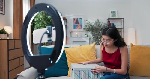 Young Adult Reviewing Product on Smartphone