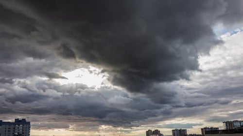 Dramatic Grey Clouds Time Lapse over City