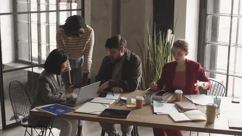 Business Meeting in Loft Office