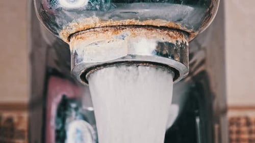Faucet with Water and Limescale