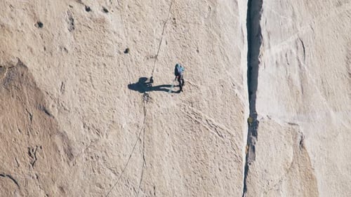 Woman Climbing Mountain on Summer Day Female Climbing By Yosemite Mountains