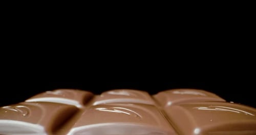Close Up of Milk Chocolate Bar with Rounded Edges