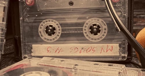 Vintage Cassette Tape Wheels Turning Close Up