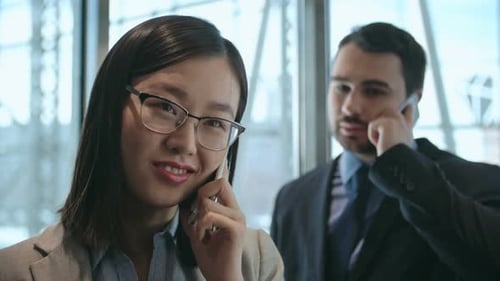 Business Woman Phone Call in Corporate Setting