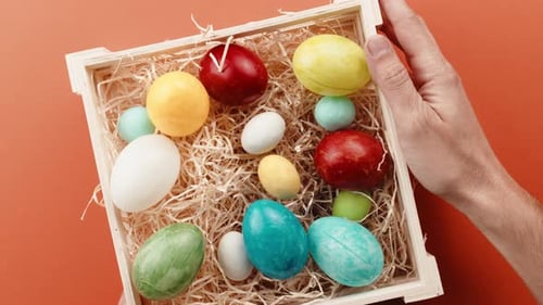Colorful Easter Eggs in Rustic Wooden Box