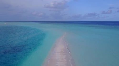 Drone sky of coast beach by blue water with sand background