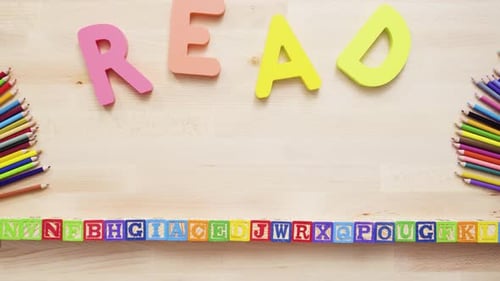 Learning to Read and Write with Colorful Blocks