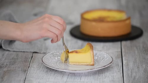 Cutting Into Delicious Piece of Yellow Cake