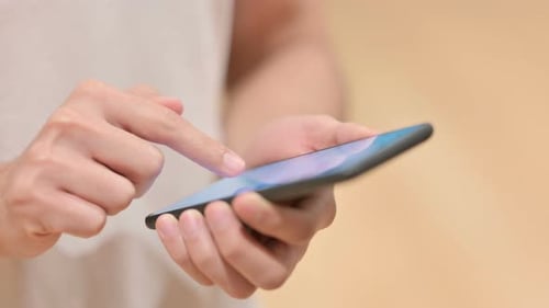 Hands Using Modern Smart Phone Close Up