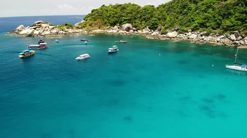 Tourist Boats in Tropical Bay. Drone View of Tourist Boats with Divers and Snorkelers Floating on