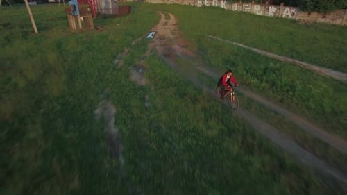 Aerial View of Boy Riding a Bike at Summer, Russia