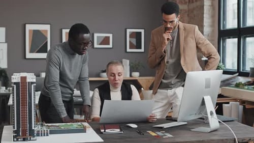 Chief Architect Talking to Employees