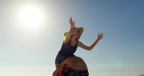 Couple Having Fun on The Beach