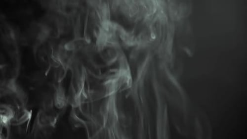 Swirling White Smoke on a Black Background