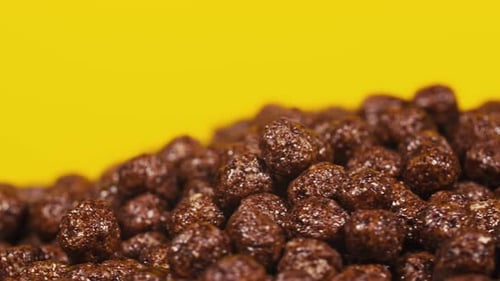 Chocolate Puffs on a Yellow Background