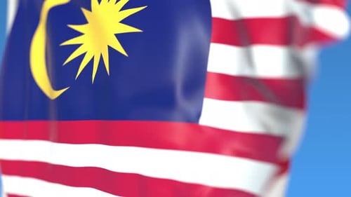 Realistic Malaysia Flag Waving Loop with Blue Sky