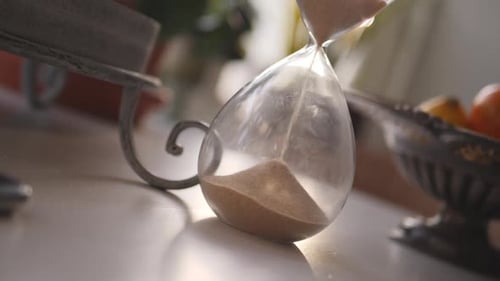 Hourglass with Sand Trickling Down
