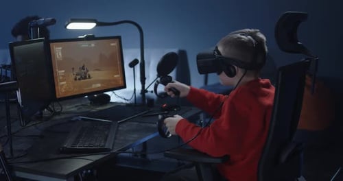 Boy Playing VR Video Game with Headset