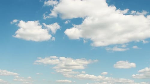 Clouds Drifting in Blue Sky