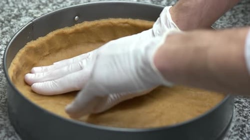 Forming Pie Crust in Baking Pan with Gloves