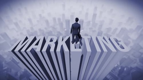 Businessman on Marketing Text Overlooking Modern City