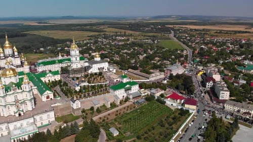 Top view of the Pochaev Lavra at the moment when a lot of people enter it.