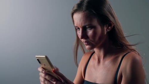 Woman Using Mobile Phone