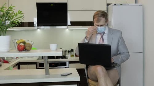 Quarantine. Businessman Working on Laptop at Home Office. Coronavirus