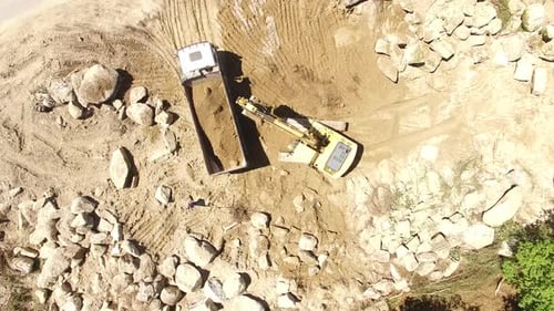 Excavator with Trucks