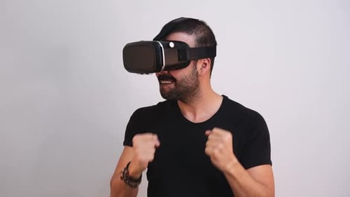 Man Excitedly Experiencing Virtual Reality Headset