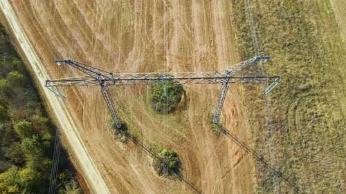 High Voltage Tower with Electric Power Lines Transfening Electrical Energy Through Cable Wires