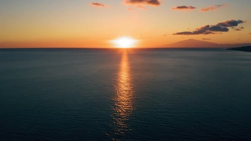 Sun goes down on the ocean