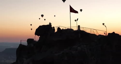 Aerial Cinematic Drone View of Colorful Hot Air Balloon Flying Over Cappadocia