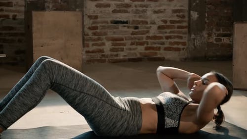 Sport woman doing abs crunch exercise, fitness workout at gym